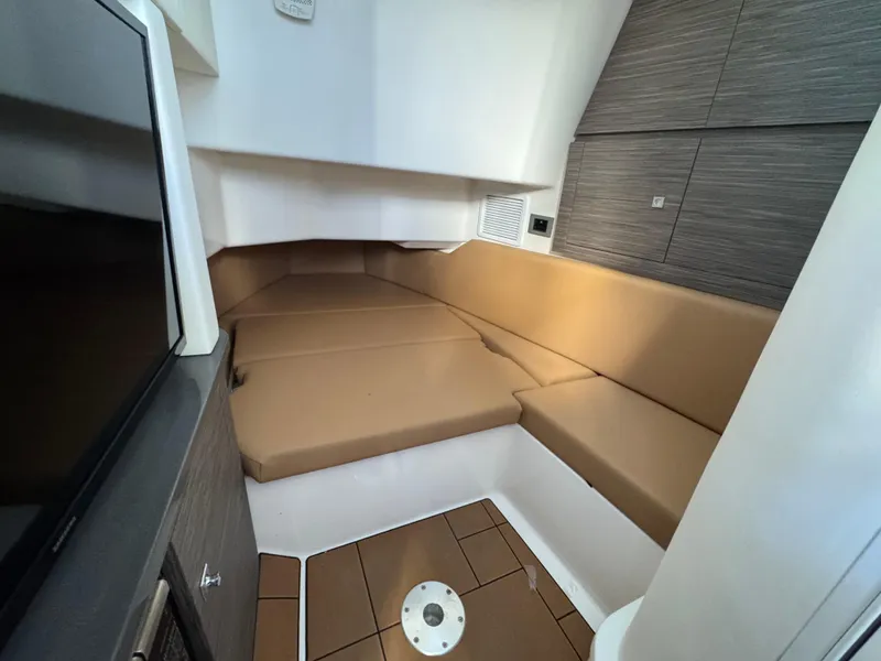 Slide: The Image of Interior cabin of 2022 Aviara AV36 OB with tan seating and modern design. - 30