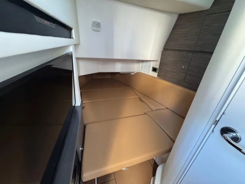 Slide: The Image of 2022 Aviara AV36 OB cabin interior with beige seating and modern design. - 31