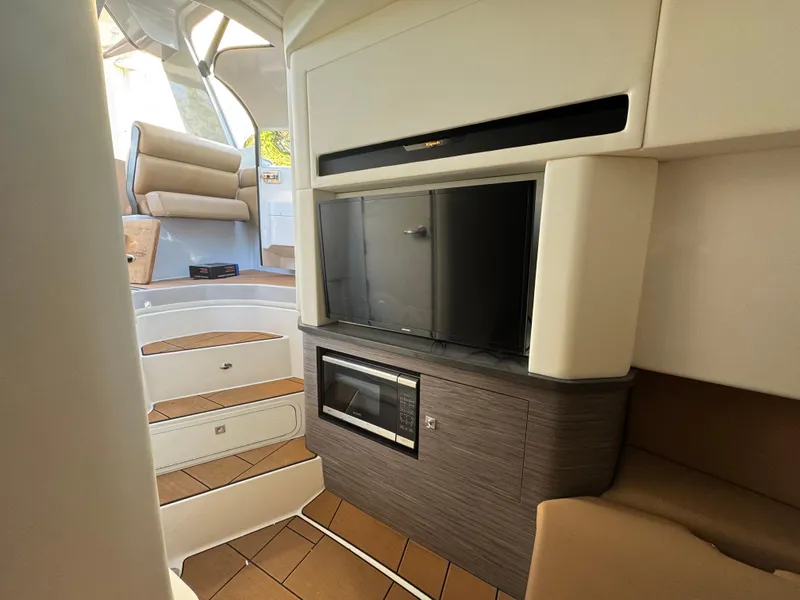 Slide: The Image of 2022 Aviara AV36 OB interior with modern kitchen and seating area. - 32