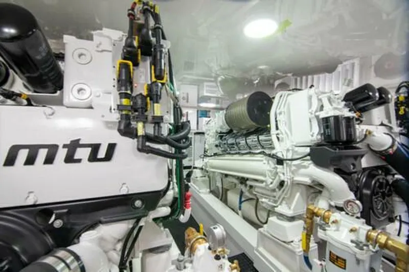 Slide: The Image of Engine room of 2024 Viking 68 Enclosed Bridge yacht with MTU engines. - 32