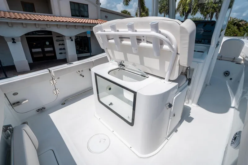 Slide: The Image of 2025 Sea Hunt Gamefish 25 boat interior with seating and storage features. - 15
