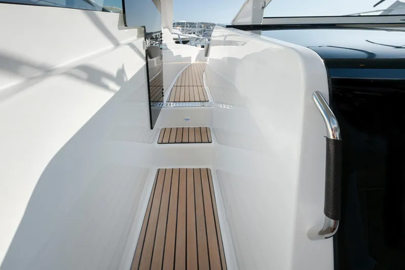 Slide: The Image of 2025 Beneteau 32 Gran Turismo yacht with sleek deck design and modern features. - 8