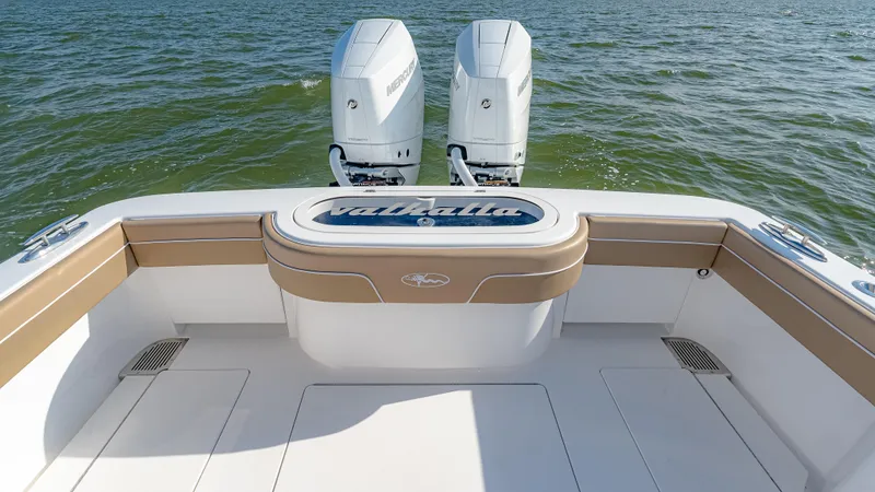 Slide: The Image of 2025 Valhalla Boatworks V-33 with twin engines on open water. - 12