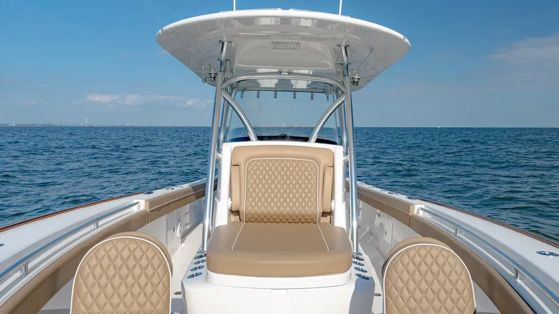 Slide: The Image of 2025 Valhalla Boatworks V-33 on open water, featuring elegant seating and sleek design. - 31