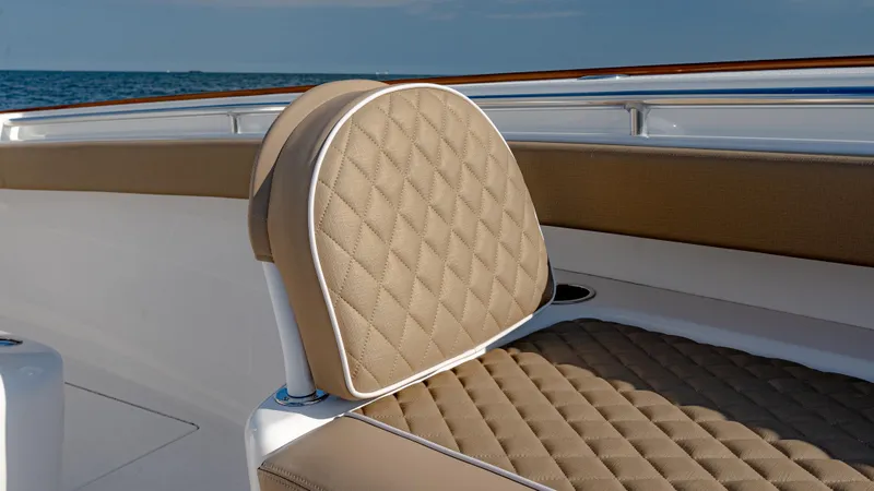 Slide: The Image of Luxurious seating on 2025 Valhalla Boatworks V-33 with diamond-stitched upholstery. - 37