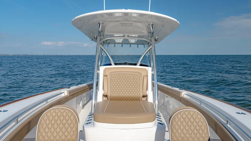 Slide: The Image of 2025 Valhalla Boatworks V-33 on open water, featuring luxurious seating and sleek design. - 39