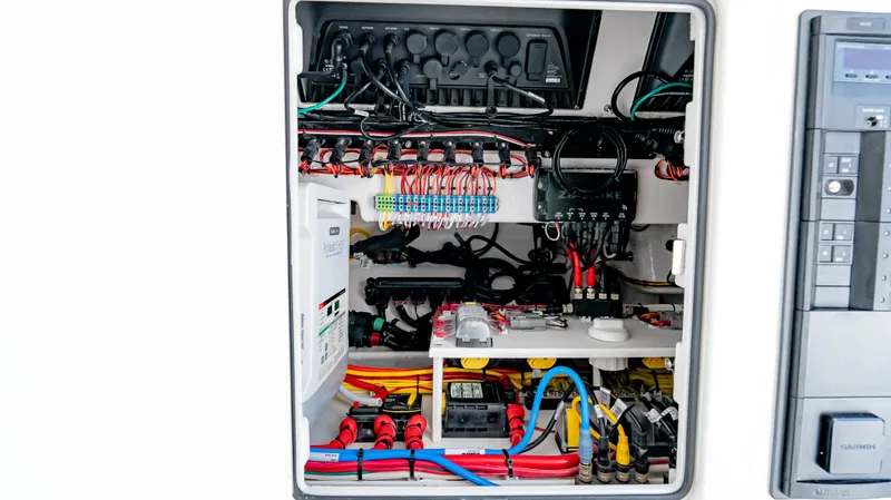 Slide: The Image of Electrical panel of 2025 Valhalla Boatworks V-33, showcasing wiring and components. - 41