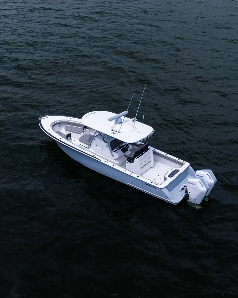 Slide: The Image of 2025 Valhalla Boatworks V-33 on open water, aerial view. - 2