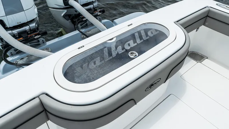 Slide: The Image of 2025 Valhalla Boatworks V-33, featuring sleek deck design and modern livewell. - 7
