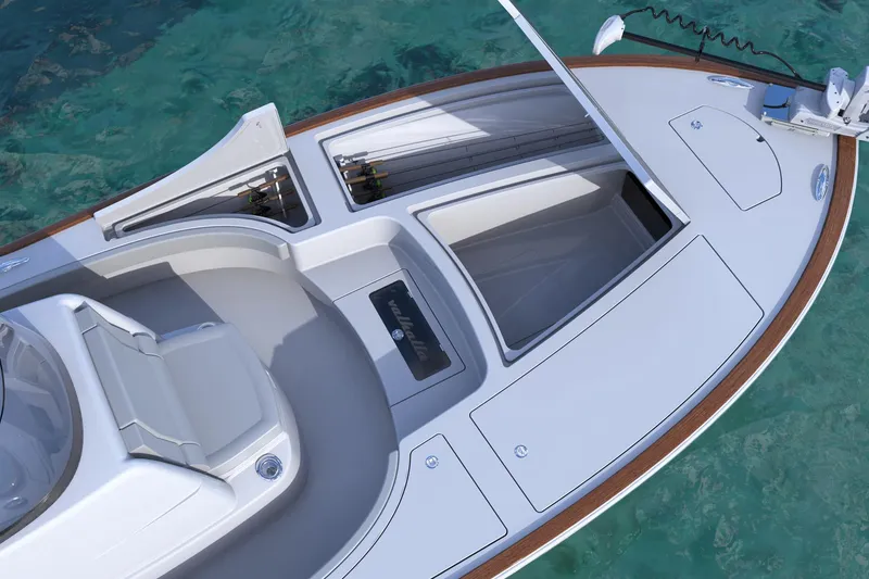 Slide: The Image of 2025 Valhalla Boatworks V-28 Bay, sleek design, spacious deck, turquoise water background. - 4