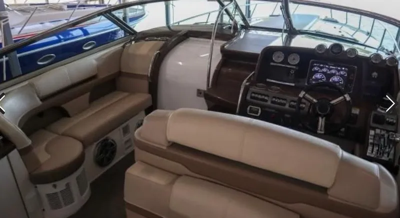 Slide: The Image of 2016 Formula 400 Super Sport boat interior with luxurious seating and advanced dashboard controls. - 15