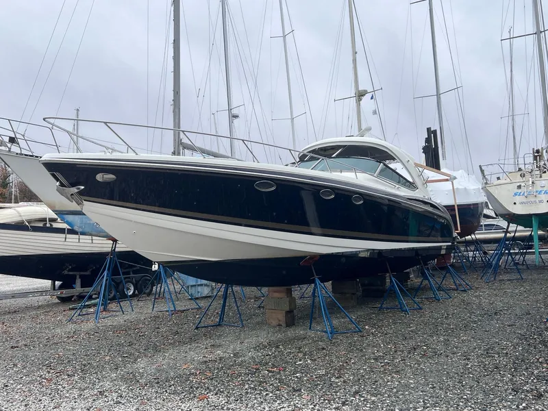 Slide: The Image of 2016 Formula 400 Super Sport boat on stands in a marina. - 18