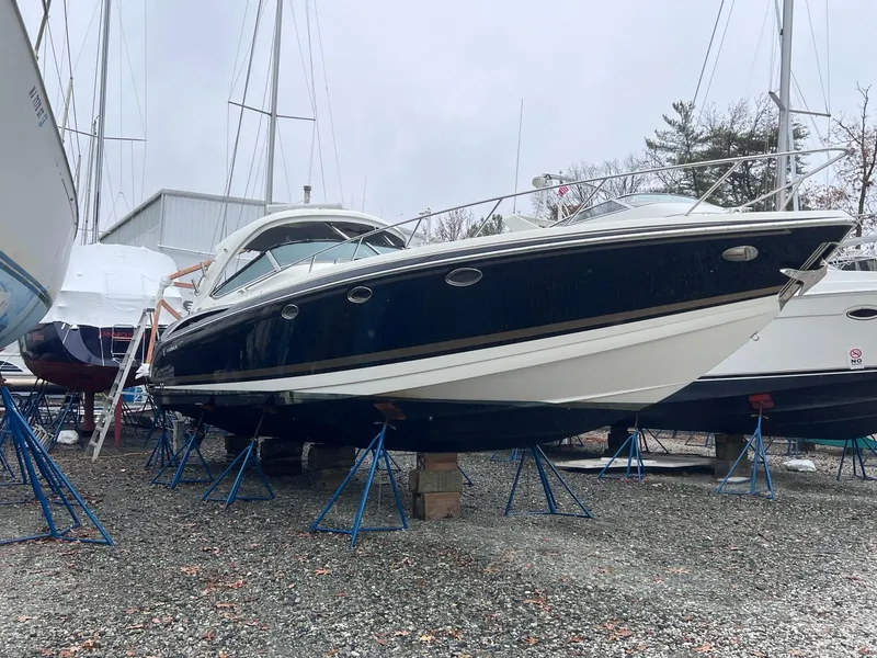 Slide: The Image of 2016 Formula 400 Super Sport boat on stands in a boatyard. - 19