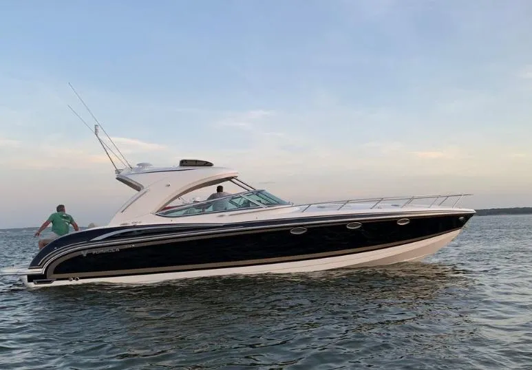 Slide: The Image of 2016 Formula 400 Super Sport boat cruising on open water. - 3