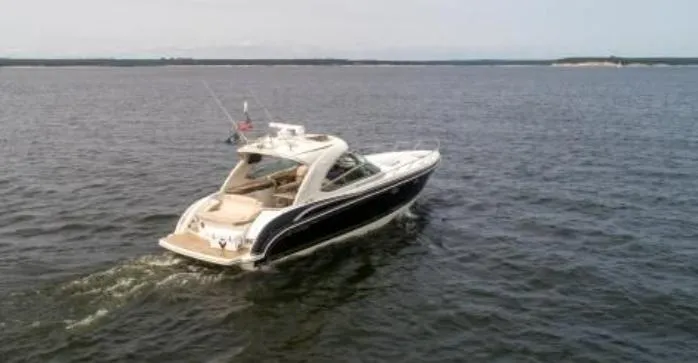 Slide: The Image of 2016 Formula 400 Super Sport yacht cruising on open water. - 4