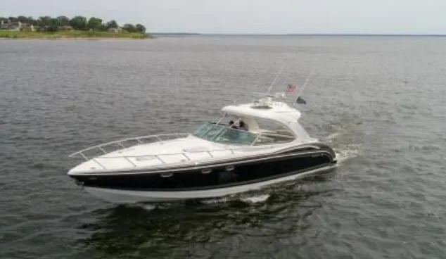 Slide: The Image of 2016 Formula 400 Super Sport yacht cruising on open water. - 6