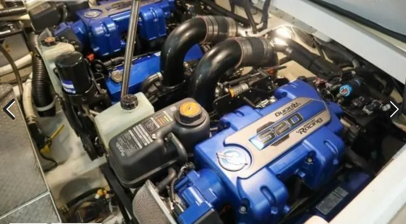 Slide: The Image of 2016 Formula 400 Super Sport engine compartment with dual blue Mercury 520 engines. - 8