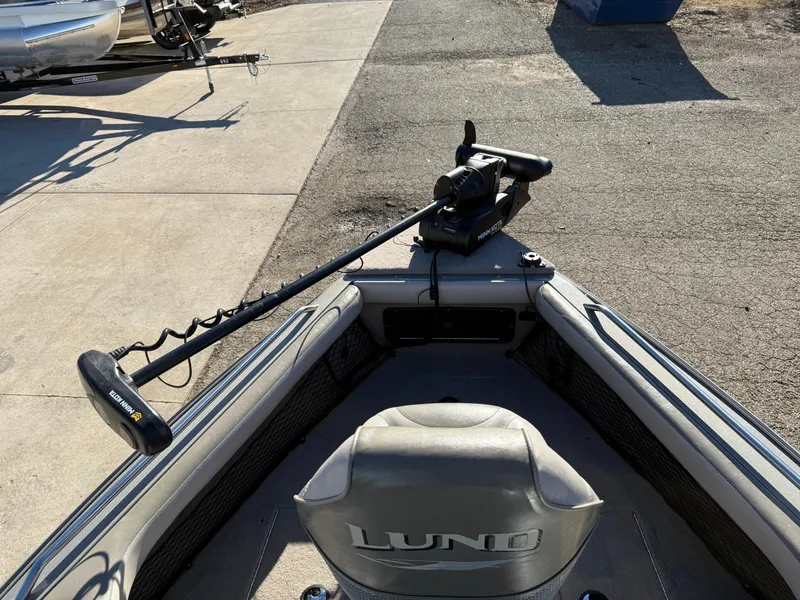 Slide: The Image of 2001 Lund 1950 Tyee Magnum GS ITS boat with trolling motor on deck. - 10