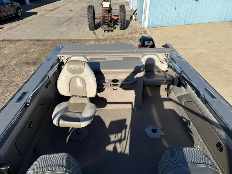 Slide: The Image of Interior of 2001 Lund 1950 Tyee Magnum GS ITS boat with seating and storage. - 26
