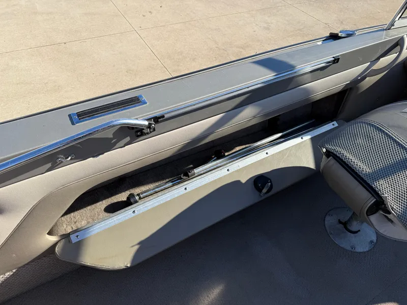 Slide: The Image of Interior view of a 2001 Lund 1950 Tyee Magnum GS ITS boat, showing seating and storage. - 27