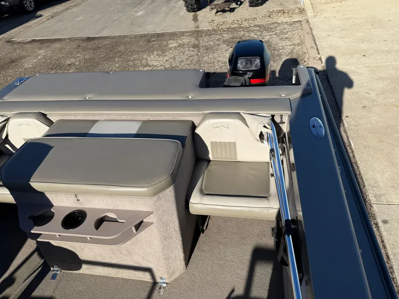 Slide: The Image of 2001 Lund 1950 Tyee Magnum GS ITS boat interior with seating and motor. - 30