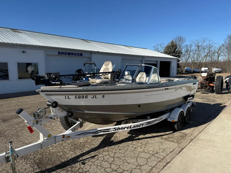 Slide: The Image of 2001 Lund 1950 Tyee Magnum GS ITS boat on ShoreLand'r trailer outside showroom. - 8