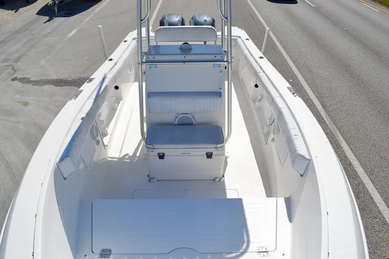 Slide: The Image of 2006 Clearwater 2500 WI CC boat interior with seating and console. - 18