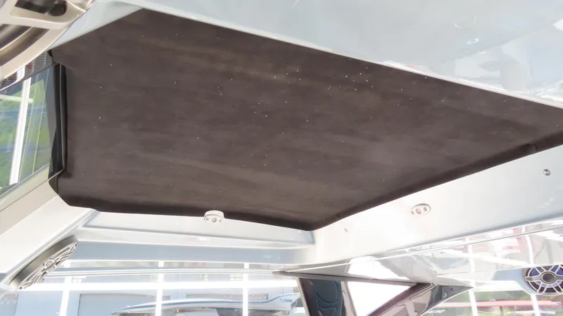 Slide: The Image of Interior view of 2022 MTI 50v boat ceiling with sleek design and modern features. - 15