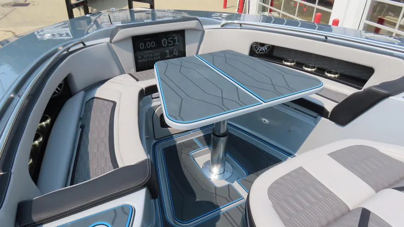 Slide: The Image of Modern MTI 50v boat interior with sleek seating and a stylish table, 2022 model. - 24