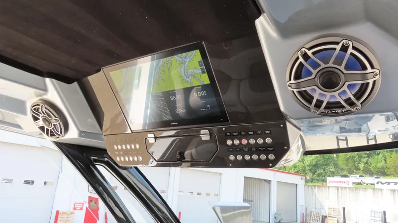 Slide: The Image of Boat dashboard with navigation screen and speakers, MTI 50v model, 2022. - 31