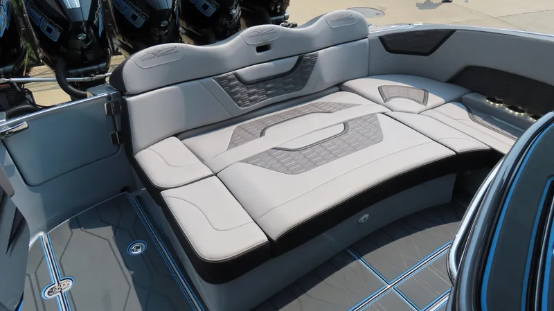 Slide: The Image of Luxurious seating area on a 2022 MTI 50v boat, featuring sleek, modern design. - 33