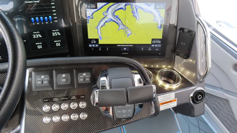 Slide: The Image of Control panel of 2022 MTI 50v boat with navigation screen and throttle. - 35