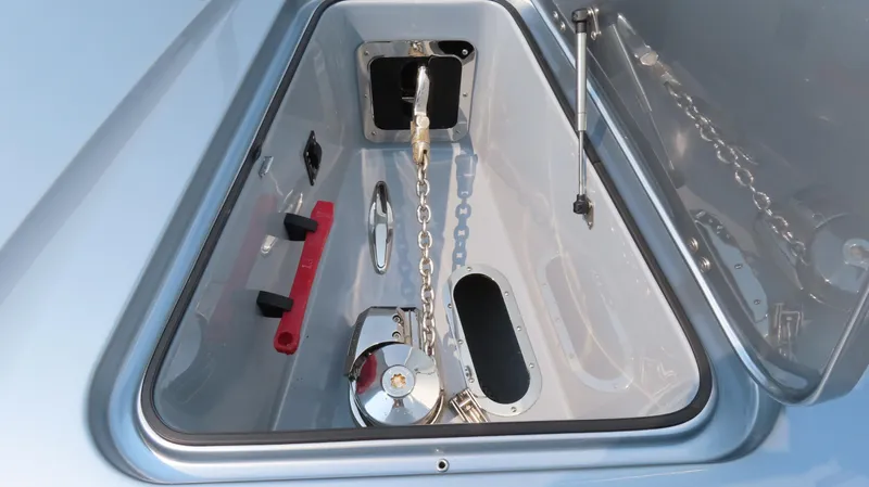 Slide: The Image of Anchor compartment of 2022 MTI 50v boat with chain and winch. - 39