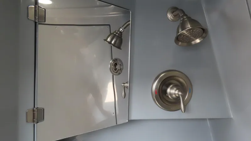 Slide: The Image of Stainless steel shower fixtures in a modern MTI 50v, 2022 model. - 49