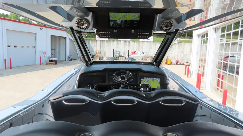 Slide: The Image of Interior view of 2022 MTI 50v boat with advanced navigation system and sleek design. - 8