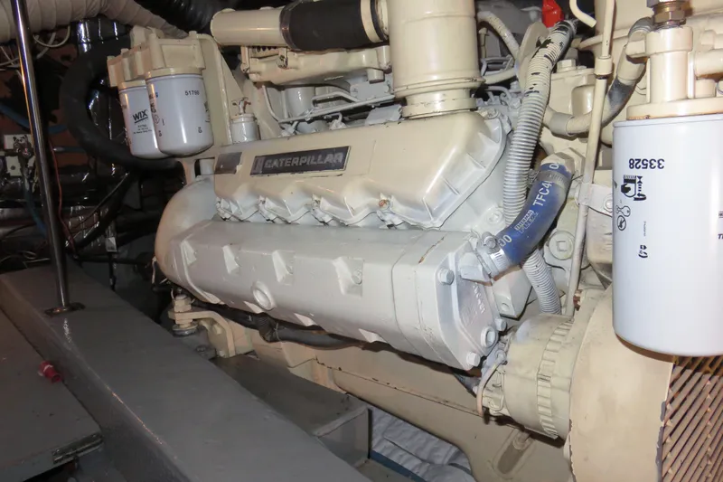 Slide: The Image of Engine room of 1988 Carver 42 Aft Cabin Motor Yacht with Caterpillar engine. - 106