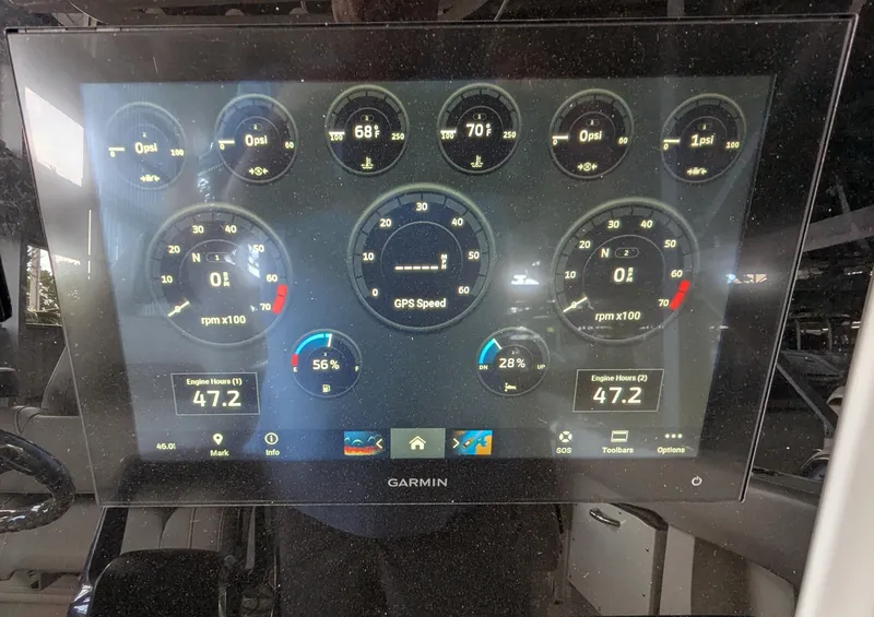 Slide: The Image of Garmin display on 2023 Sailfish 272 CC showing engine and GPS data. - 6