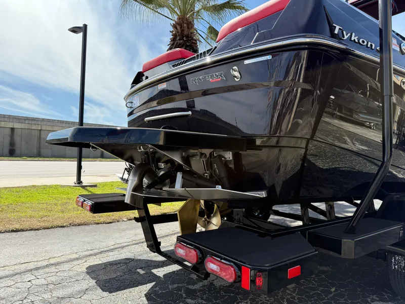 Slide: The Image of 2025 Moomba Tykon boat rear view with propeller and platform. - 19