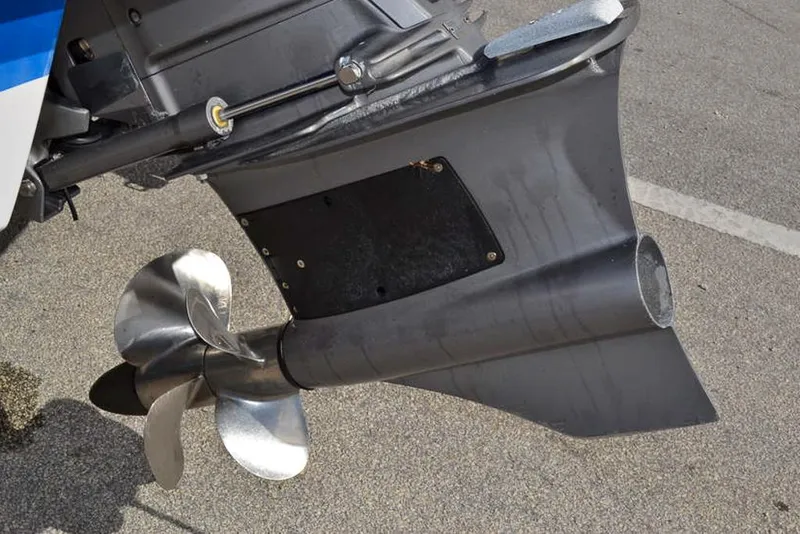 Slide: The Image of Propeller of 2021 Chaparral 23 Surf boat on pavement background. - 10