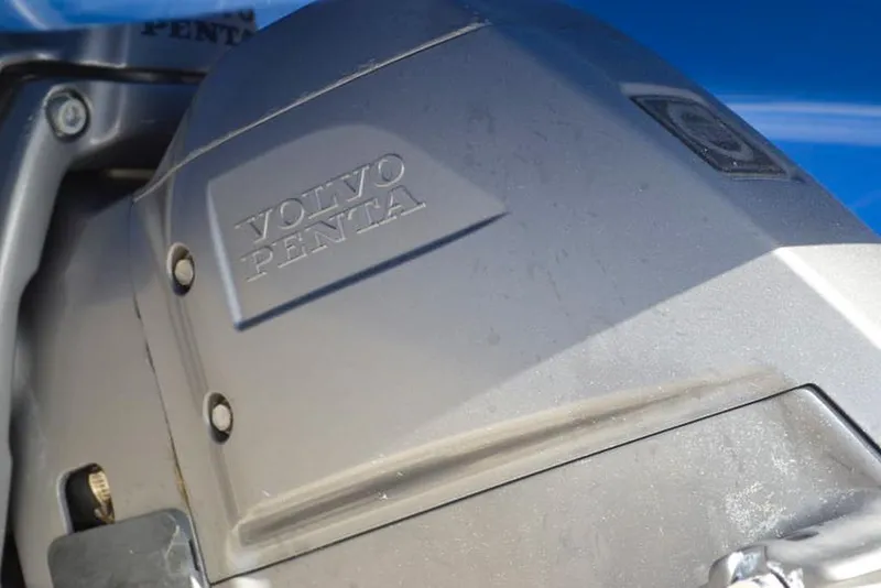Slide: The Image of Close-up of Volvo Penta engine on 2021 Chaparral 23 Surf boat. - 9