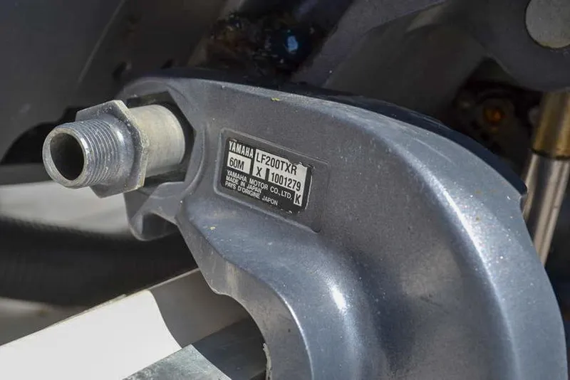 Slide: The Image of Close-up of a Yamaha LF200TXR engine part on a 2006 Clearwater 2500 WI CC boat. - 22
