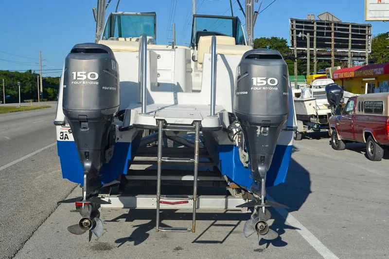 Slide: The Image of 2011 Glacier Bay 2740 Dual Console boat with twin 150 horsepower outboard engines. - 5