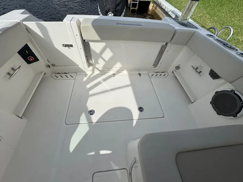 Slide: The Image of 2021 Boston Whaler 240 Vantage boat interior, featuring spacious seating and storage areas. - 33