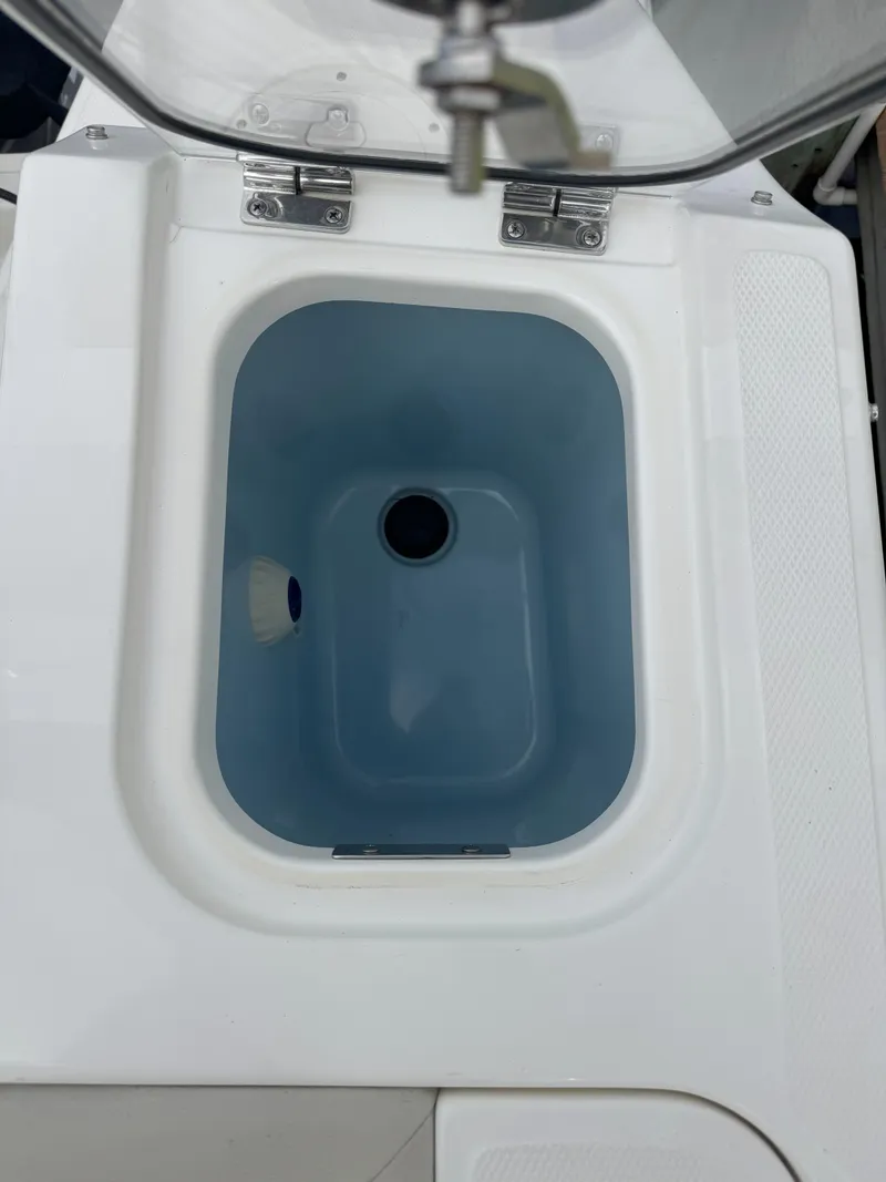 Slide: The Image of Livewell compartment on a 2021 Boston Whaler 240 Vantage boat. - 36