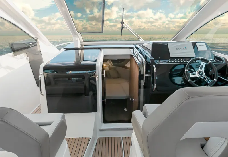 Slide: The Image of Interior view of 2025 Beneteau 32 Gran Turismo yacht cockpit with modern design. - 10