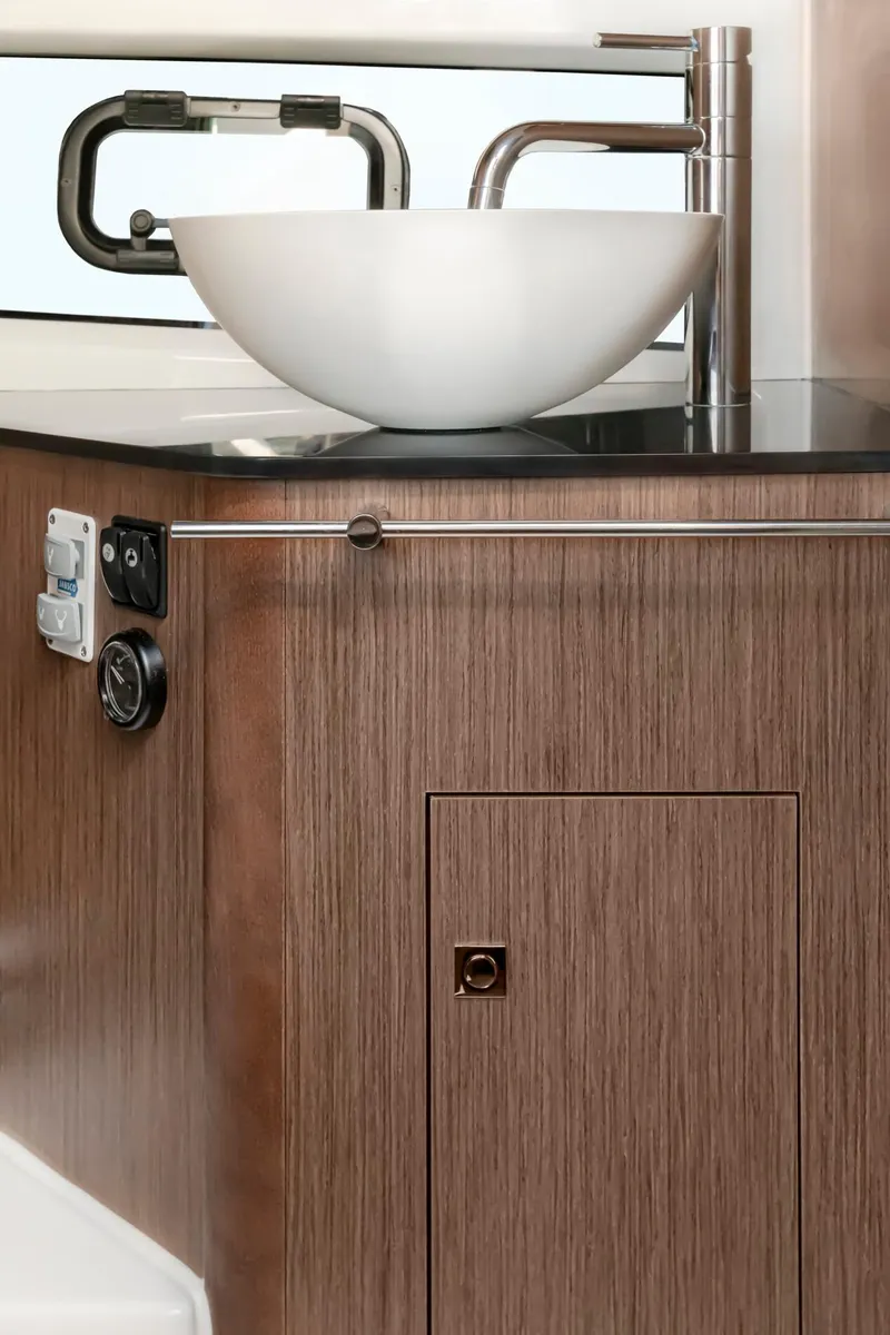Slide: The Image of Modern bathroom sink in 2025 Beneteau 32 Gran Turismo yacht. - 23