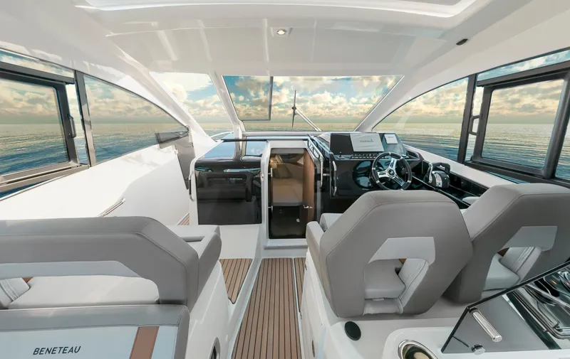 Slide: The Image of 2025 Beneteau 32 Gran Turismo yacht interior with modern helm and seating. - 9