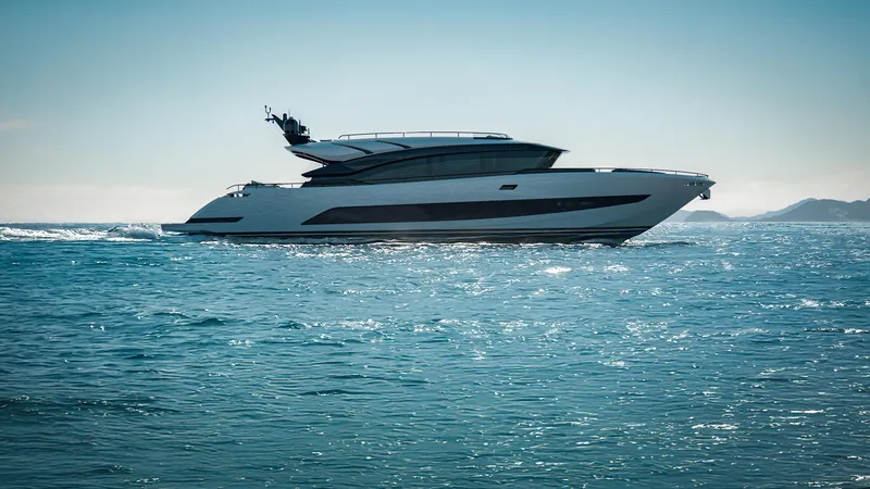 Slide: The Image of 2026 AB 95C yacht cruising on open sea under clear blue sky. - 2