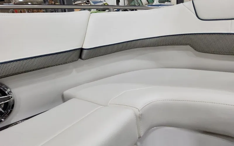 Slide: The Image of Luxurious seating in 2025 Formula 310 Bowrider I/O boat, featuring sleek white upholstery. - 12