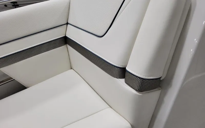 Slide: The Image of 2025 Formula 310 Bowrider I/O interior seating with sleek white upholstery and modern design. - 17